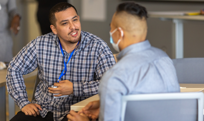 Two men having a conversation